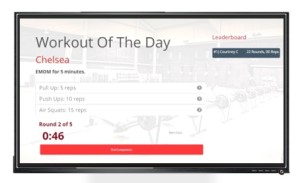 Gym member using wod tracking software to track their performance