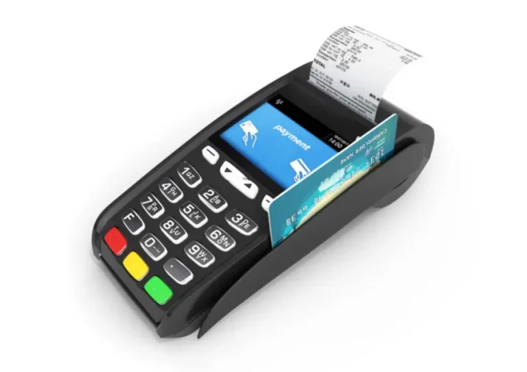 A contactless payment system sitting on a desk at the gym